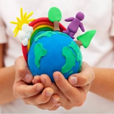 Child holding a globe